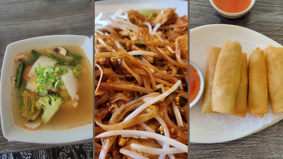 Plates of Thai food on a casual table.