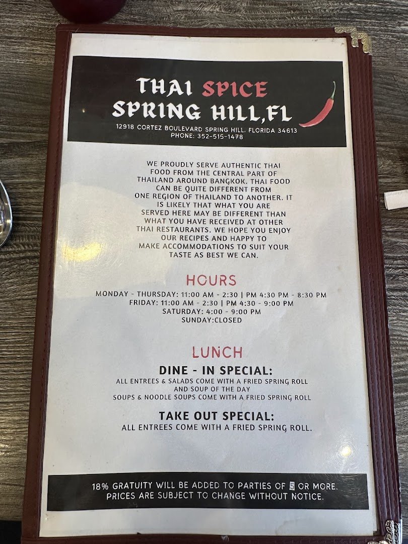Freshly plated Thai meals with tea.